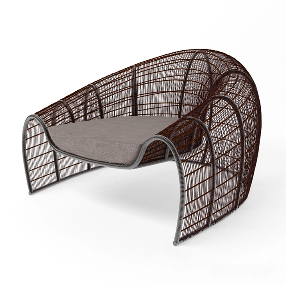 Armchair Croissant by Kenneth Cobonpue