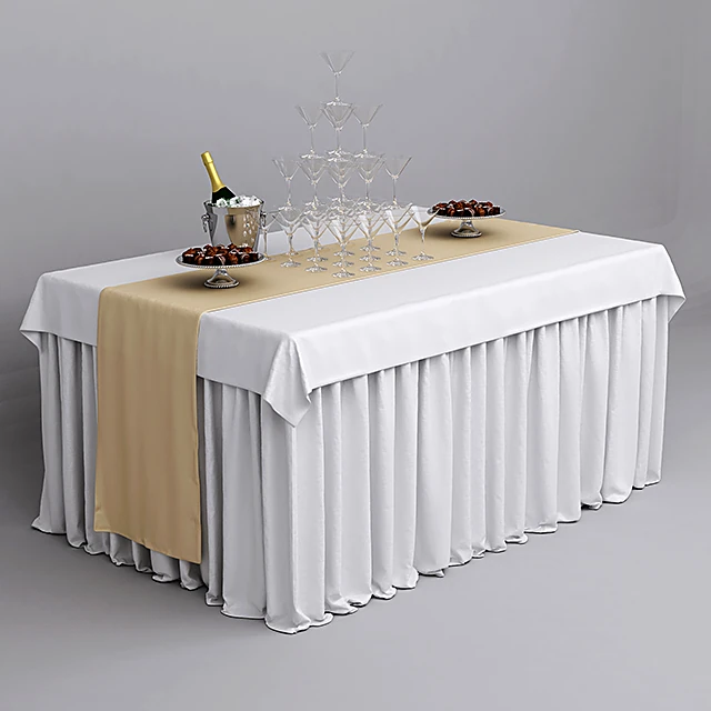 Festive Table Setting with Champagne Pyramid and Gold Runner