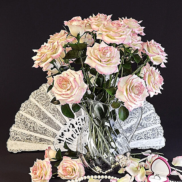 Floral Arrangement with Roses in a Glass Pitcher
