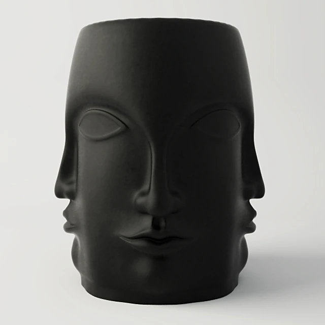 Decorative Stool with Carved Faces