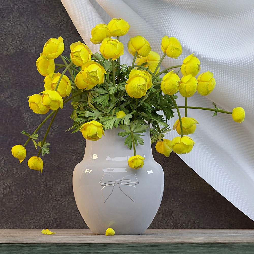 Bouquet of flowers in a vase with yellow globeflowers and ceramic bow